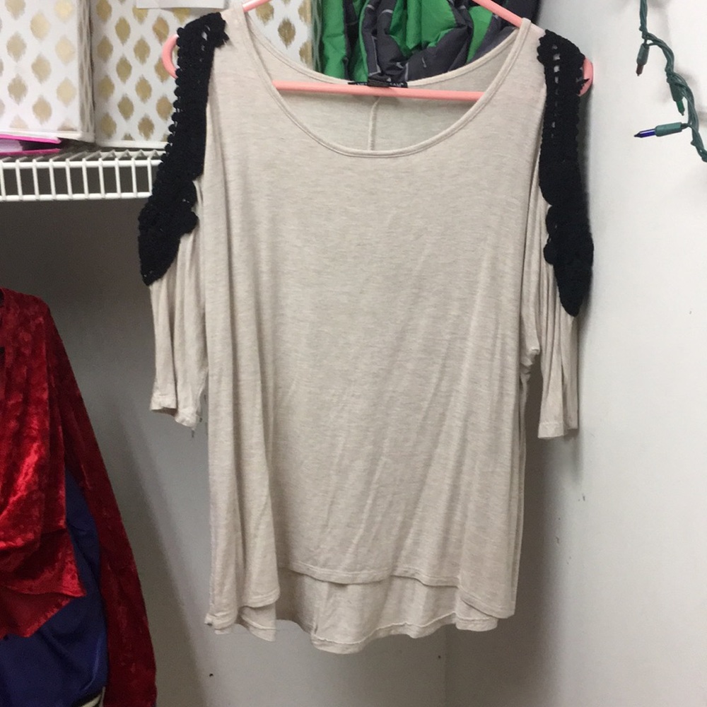 Tan and black top